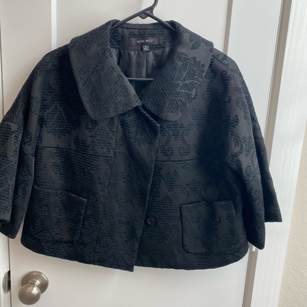 Women’s elegant short coat, size 8